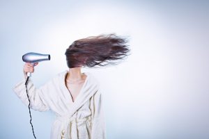 dry hair never again - woman-morning-bathrobe-bathroom