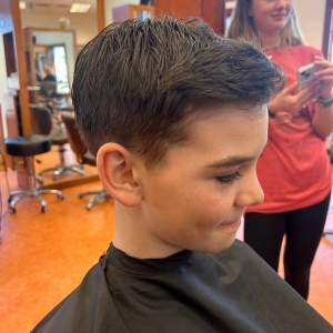 Male child with new haircut from Hairoics stylist in Nags Head, NC