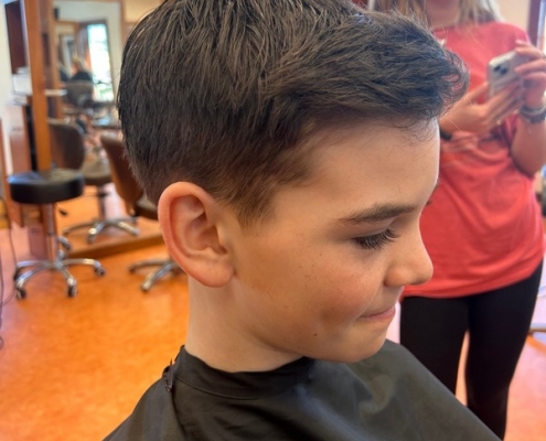 Male child with new haircut from Hairoics stylist in Nags Head, NC